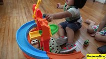 A 2 year old Boy playing some Thomas the Tank Engine & Friends Toys