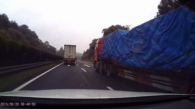 Moment driver crashes while overtaking in China