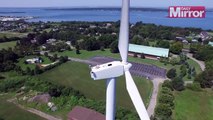 Drone pilot spots man sunbathing on top of wind turbine 200ft above ground
