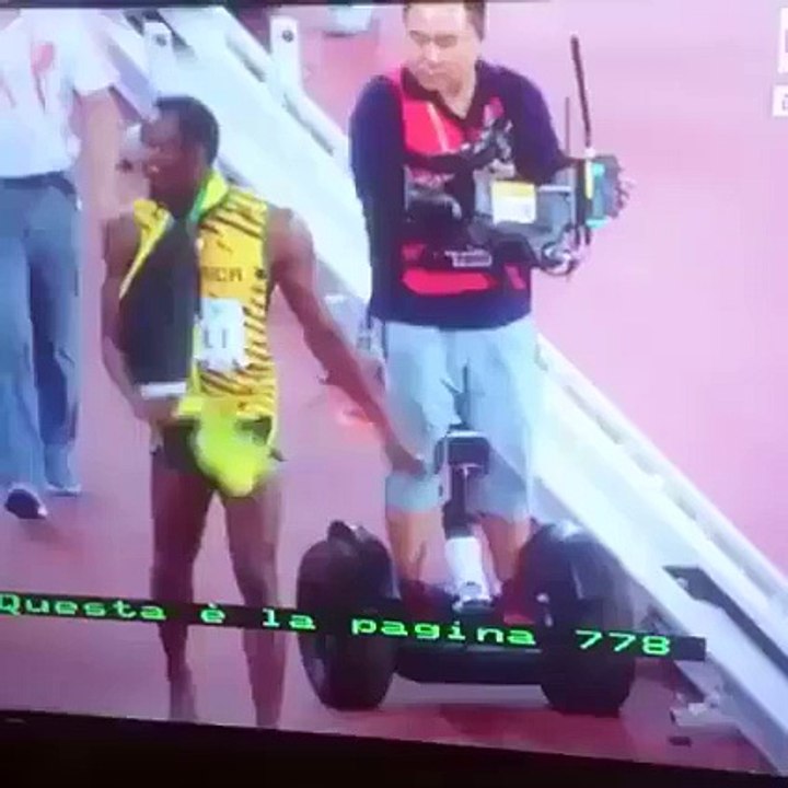 Camera man takes out Usain Bolt