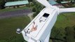 Drone pilot spots man sunbathing on top of wind turbine 200ft above ground