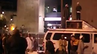 nachman guy dancing on top of a car with his kid