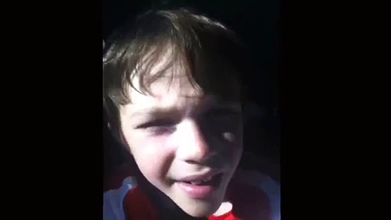 Kid sings rap song