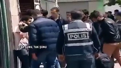 "terrorist" design-Turkish police just want a photo with Kurdish clothes-