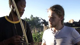 Sjoerd speaking Dutch to a Bushman in the Northern Cape, South Africa