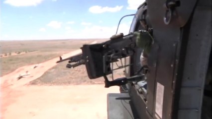 US Army UH-60 Firing at F-4 Phantom Aircrafts and Missile Launchers With Machine Gun