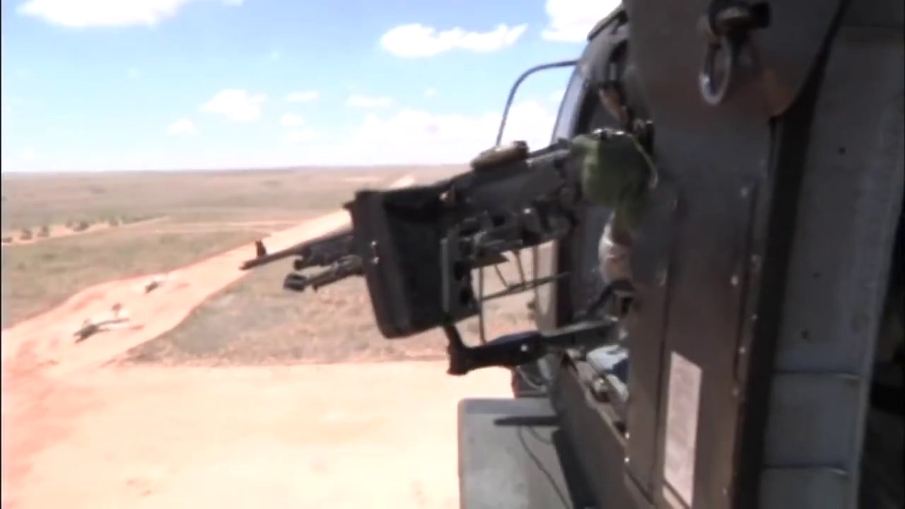 US Army UH-60 Firing at F-4 Phantom Aircrafts and Missile Launchers With Machine Gun