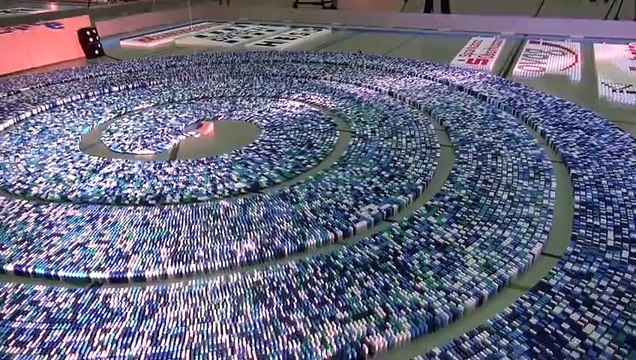275,000 Dominoes - Enjoy Your Life (Guinness World Record - Most dominoes toppled in a spiral) - YouTube