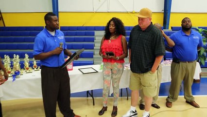 Mr & Mrs. Simpson being awarded at Wilcox Central High School Basketball ceremony