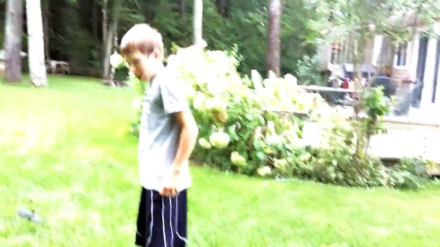 Kid fails backflip, hits face on ground HARD, bloody nose