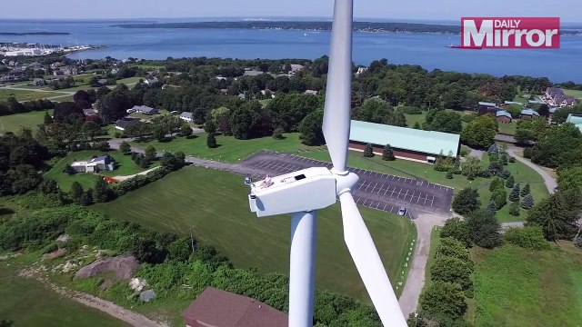 Drone pilot spots man sunbathing on top of wind turbine 200ft above ground