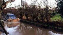 Landrover Defender takes on some flooding