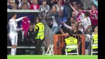 Cristiano Ronaldo gives his shirt to a child