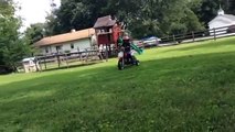3 year old riding a dirt bike