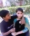 15 years Old Boy And Girl Kissing in Park