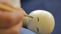 Watch a Japanese Kokeshi Doll Emerge From a Spinning Block of Wood!