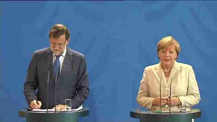 Merkel, Rajoy discuss immigration crisis in Germany