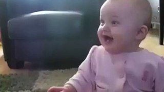 Baby girl laughing hysterically at Dog eating popcorn