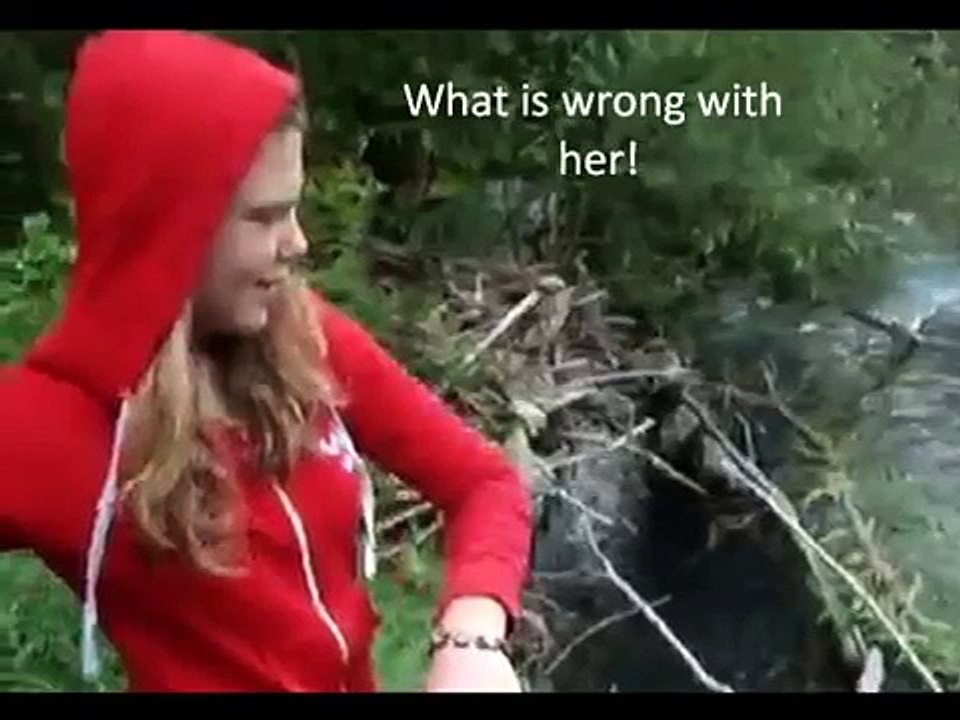 Girl drowns puppies in river by throwing them in - Original Footage