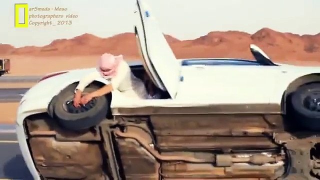 Arab change car tyres while driving