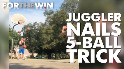 Juggler nails this 5-ball trick