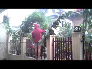 Man harvesting malunggay inspite of typhoon Glenda