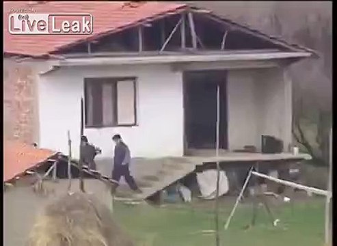 Serbe burning Albanian houses and stealing stuff (Kosovo War)