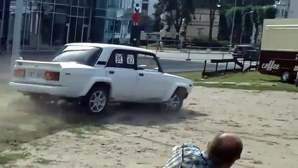 Rally car narrowly avoids crowd