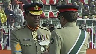 Pakistan's army chief hands over power
