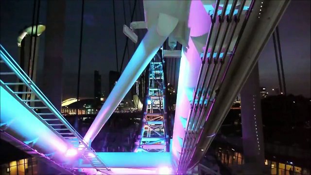 Singapore Flyer in One Minute, Time Lapse, Giant Ferris Wheel Night View Marina Bay, Like London Eye