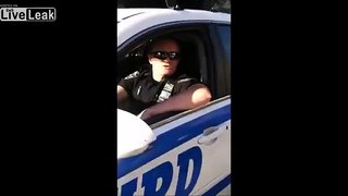 NYPD cop is not happy when a citizen wants his badge number to report him for swearing at somebody
