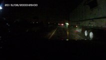 Driving down a stretch of the interstate after midnight in the rain when it really starts to rain.