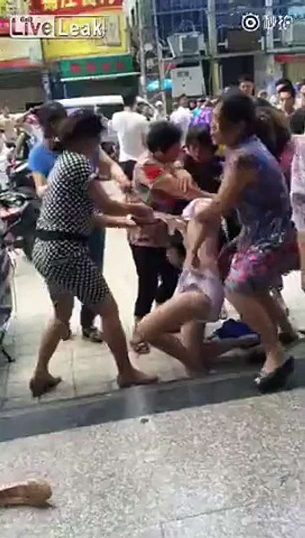 Woman being stripped in public - Dailymotion Video