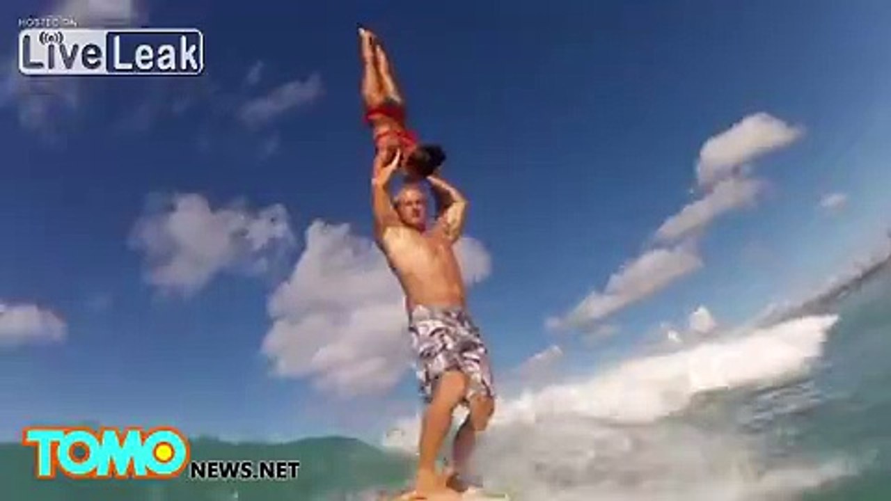 Amazing video shows gymnasts performing jaw-dropping acrobatic stunt on surfboard