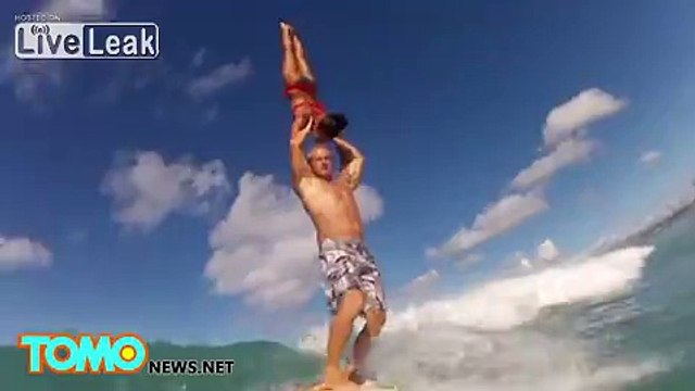 Amazing video shows gymnasts performing jaw-dropping acrobatic stunt on surfboard