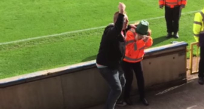 Football Crowd Plays With a Plant Pot