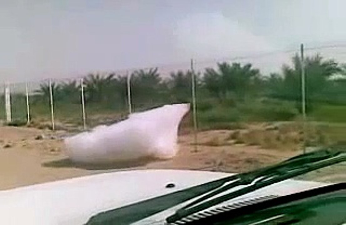 Real cloud falling from sky to ground