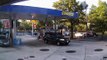 Woman Clueless As Her Purse Is Snatched While Pumping Gas