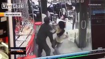 female security guard block robber in jewellery shop