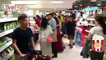 woman assaults shop worker.