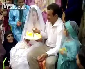 The groom slaps bride in front of family