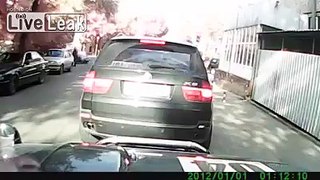 Kid runs into car.