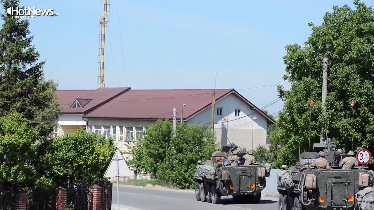 US helicopters and armored vehicles through the villages of Romania in "Cavalry march"