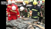 Truck in China flattens car with 6 people inside.