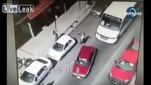 Mexican cop gets chased, caught, beaten, gun taken then runs away ALIVE.
