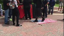 Military vet detained when she stops protestors from walking on an American flag