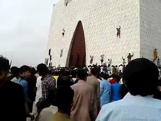 People climbing on the Tomb of Quaid-e-Azam