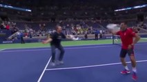 Novak Djokovic dancing with a fan after victory at US Open