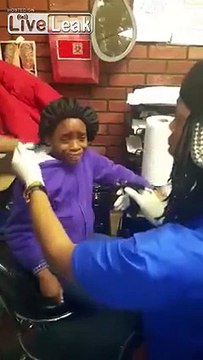 Scumbag mother forces daughter to get her ears pierced