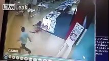 CCTV footage of woman being shot dead while walking in the shopping mall .